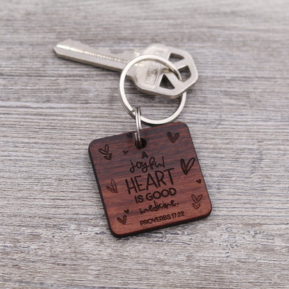 A Joyful Heart is Good Medicine Keychain
