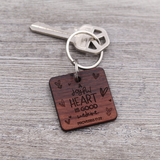 A Joyful Heart is Good Medicine Keychain