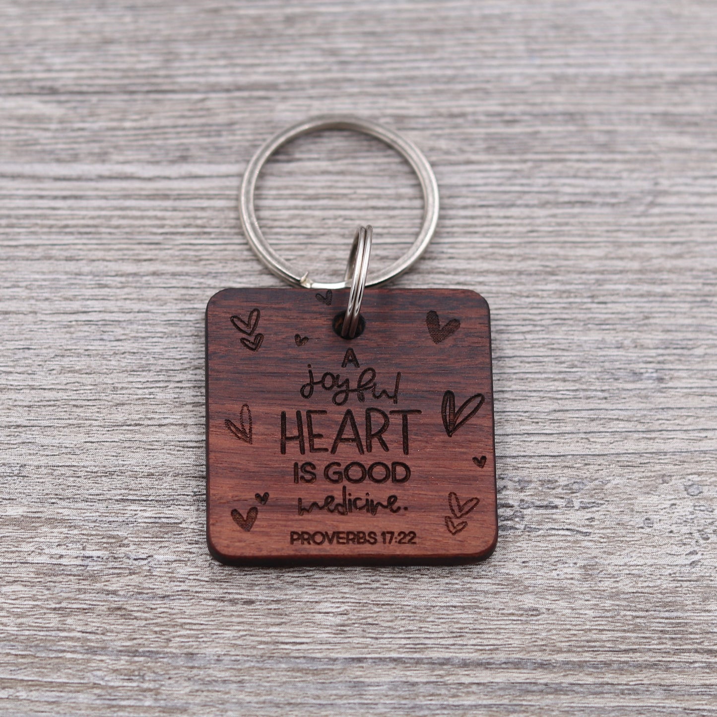 A Joyful Heart is Good Medicine Keychain