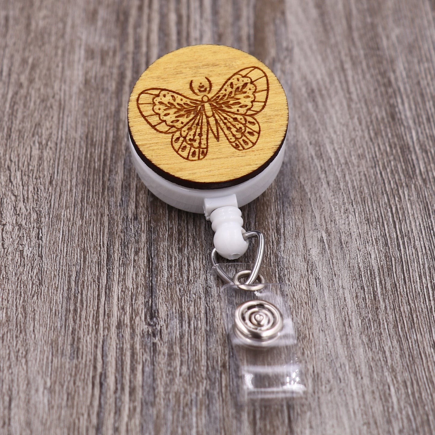Moth Badge Reel